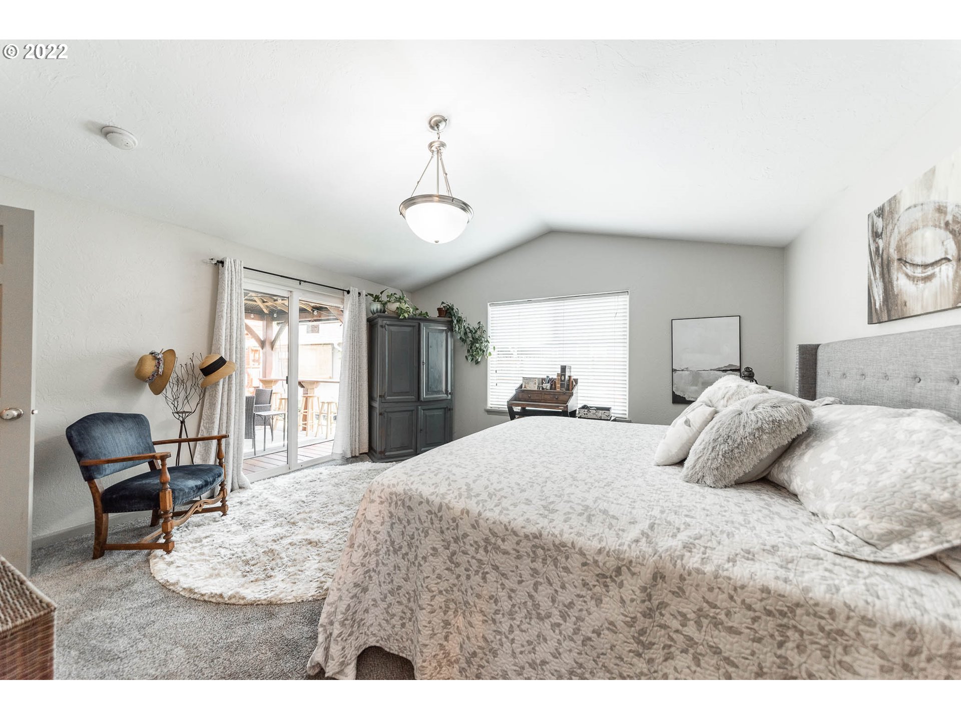 659 62nd Street Springfield, OR 97478 - Photo 12 of 32 a bedroom with a bed a table and chair
