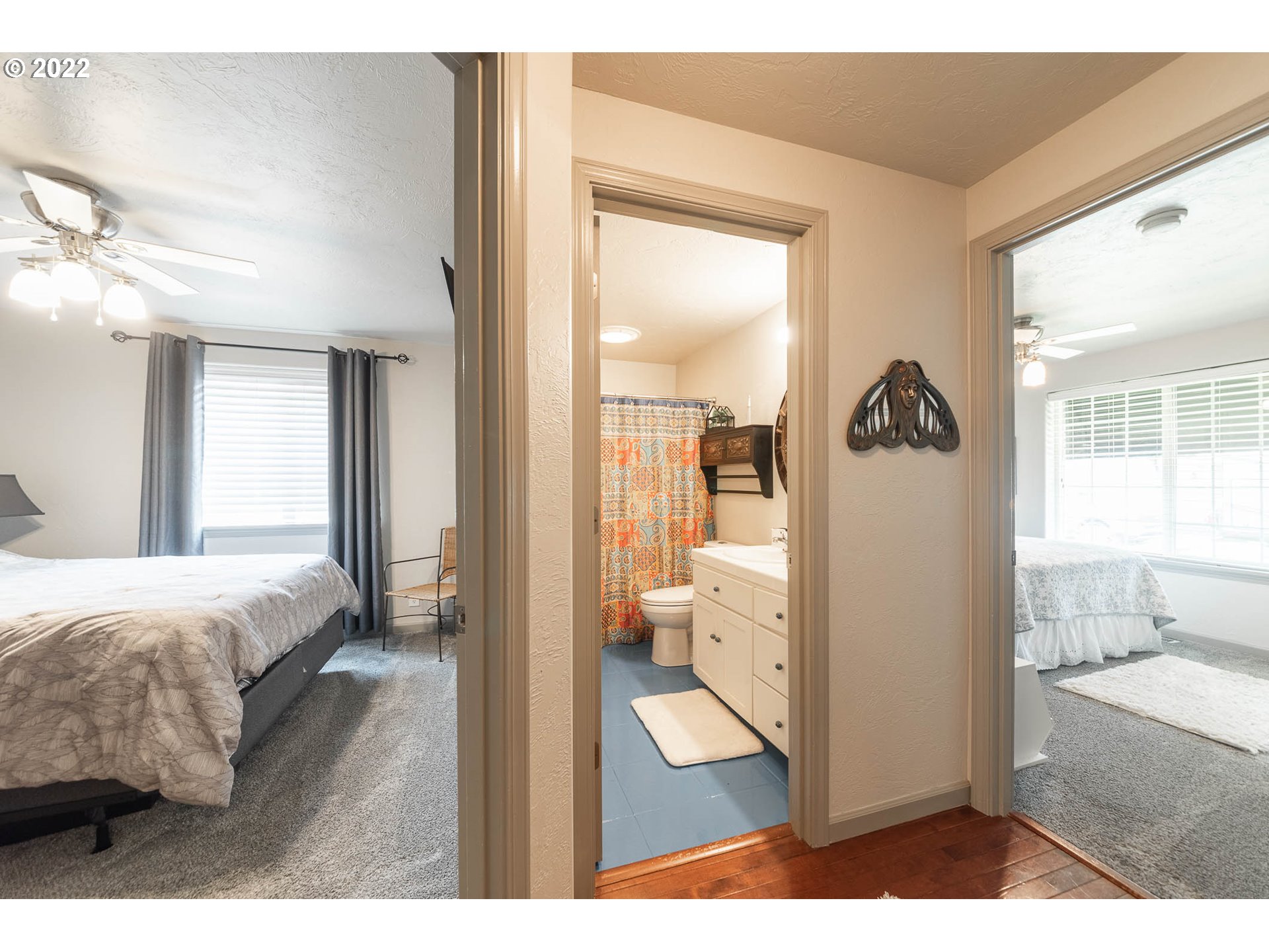 659 62nd Street Springfield, OR 97478 - Photo 7 of 32 a bedroom with a bed and glass door