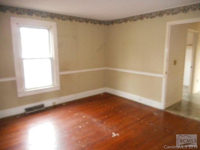 453 Poors Ford Road Rutherfordton, NC 28139 - Photo 14 of 15 a view of a small space with wooden floor and a window