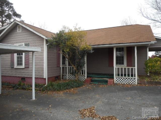 453 Poors Ford Road Rutherfordton, NC 28139 - Photo 5 of 15 a front view of a house with a garden