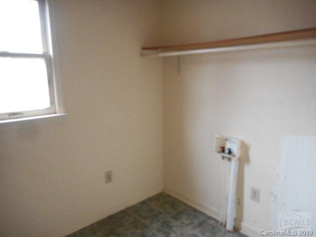 453 Poors Ford Road Rutherfordton, NC 28139 - Photo 10 of 15 a view of a room with rack on the wall and a window