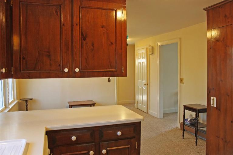 250 Cap'n Lijah's Road Centerville, MA 02632 - Photo 11 of 35 a room with a bed and a chair