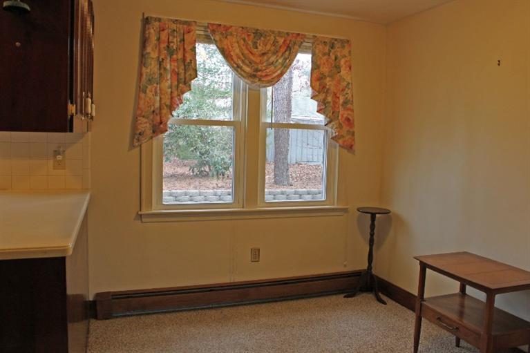 250 Cap'n Lijah's Road Centerville, MA 02632 - Photo 12 of 35 a room with window and a outdoor space
