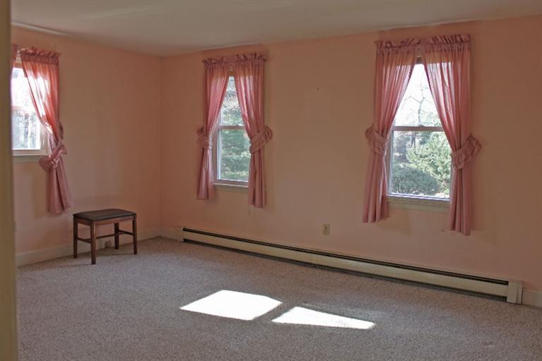250 Cap'n Lijah's Road Centerville, MA 02632 - Photo 13 of 35 an empty room with windows