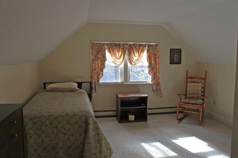 250 Cap'n Lijah's Road Centerville, MA 02632 - Photo 18 of 35 a bedroom with a bed and a window