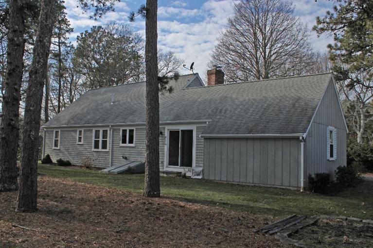 250 Cap'n Lijah's Road Centerville, MA 02632 - Photo 30 of 35 a view of a house with a yard and large tree