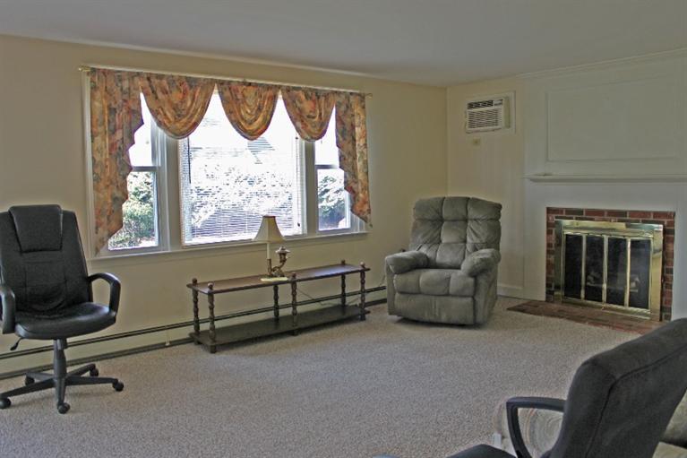 250 Cap'n Lijah's Road Centerville, MA 02632 - Photo 3 of 35 a living room with furniture and a window