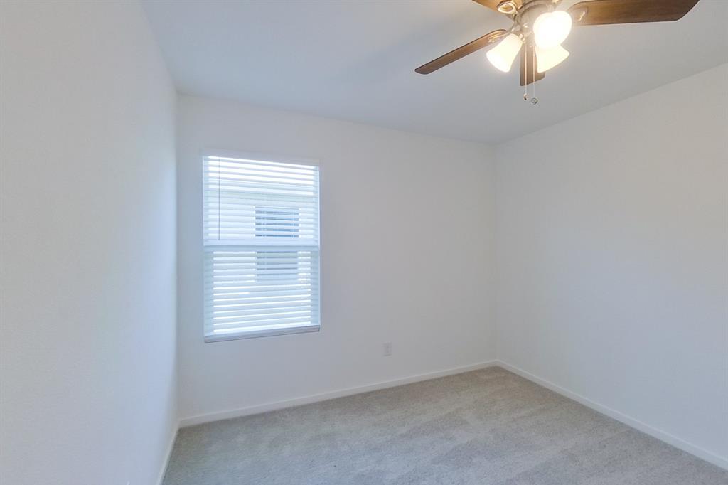 807 Ginkgo Way Princeton, TX 75407 - Photo 5 of 22 an empty room with a window