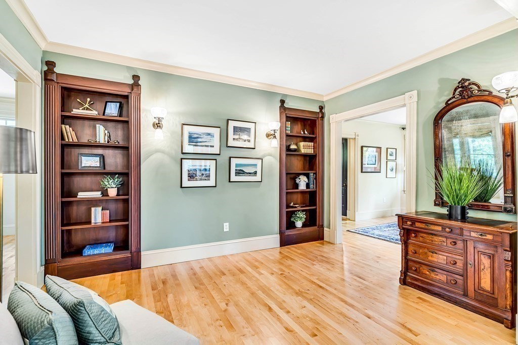44 Derby Street Concord, MA 01742 - Photo 11 of 23 a bedroom with furniture and a book shelf