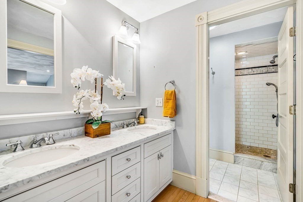 44 Derby Street Concord, MA 01742 - Photo 15 of 23 a bathroom with a sink and a mirror