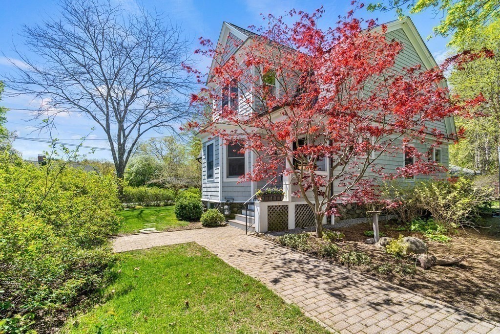 44 Derby Street Concord, MA 01742 - Photo 22 of 23 a front view of a house with garden