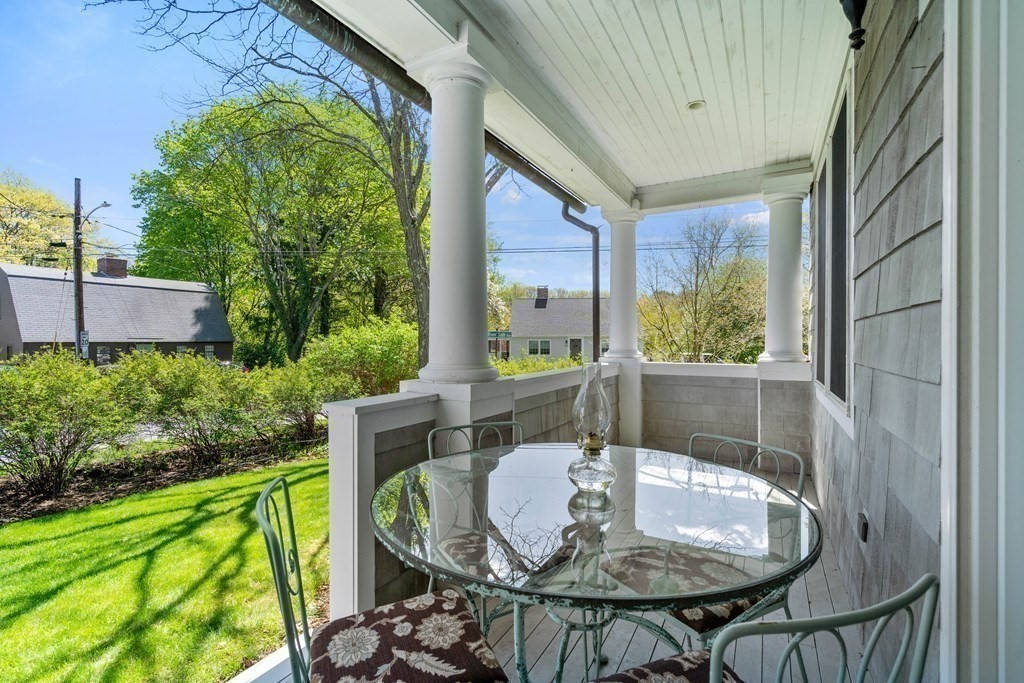 44 Derby Street Concord, MA 01742 - Photo 3 of 23 a view of balcony with a table and chairs