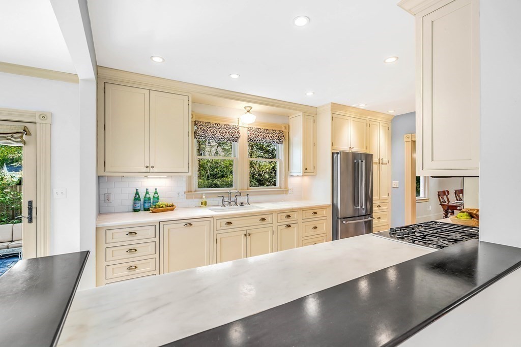 44 Derby Street Concord, MA 01742 - Photo 4 of 23 a large kitchen with stainless steel appliances a large window