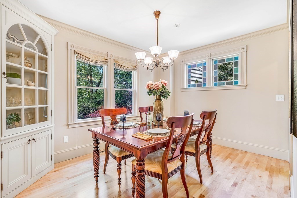 44 Derby Street Concord, MA 01742 - Photo 9 of 23 a dining room with furniture a chandelier and window