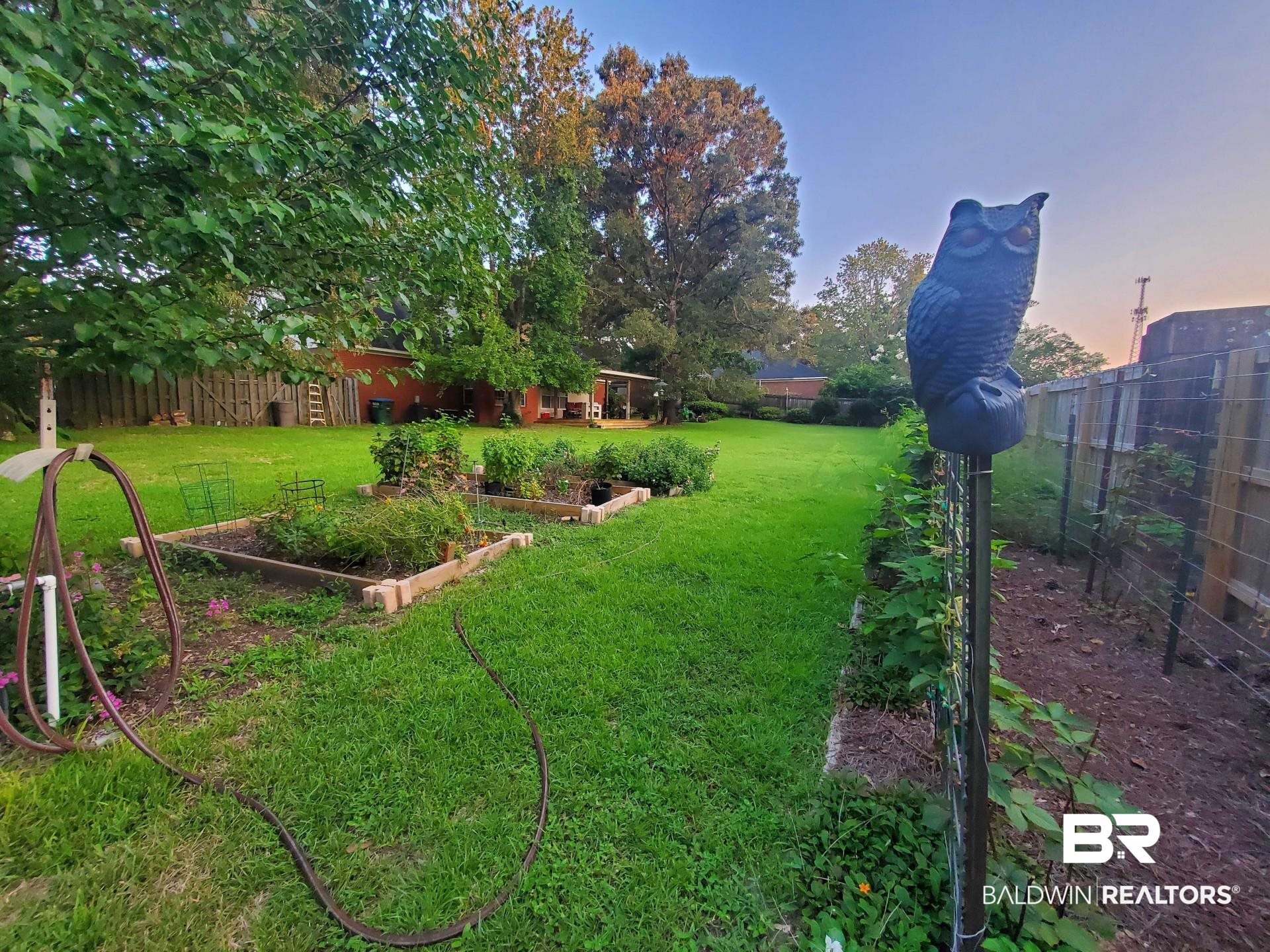 31163 Woodland Way Daphne, AL 36527 - Photo 43 of 44 View of yard at dusk