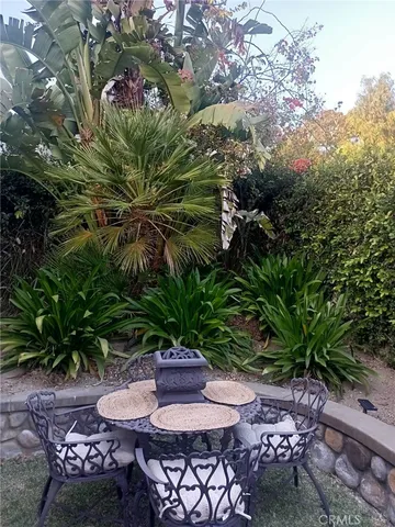 a view of outdoor sitting area with furniture