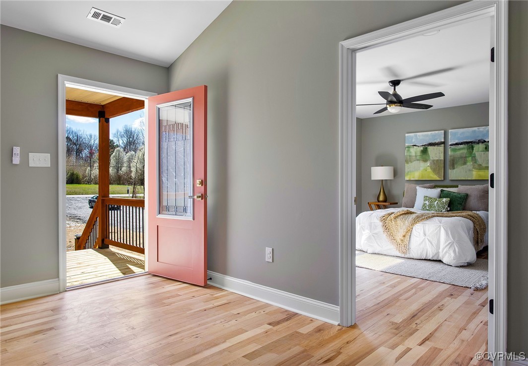 8001 Courthouse Road Providence Forge, VA 23140 - Photo 5 of 28 a bedroom with natural light and furniture