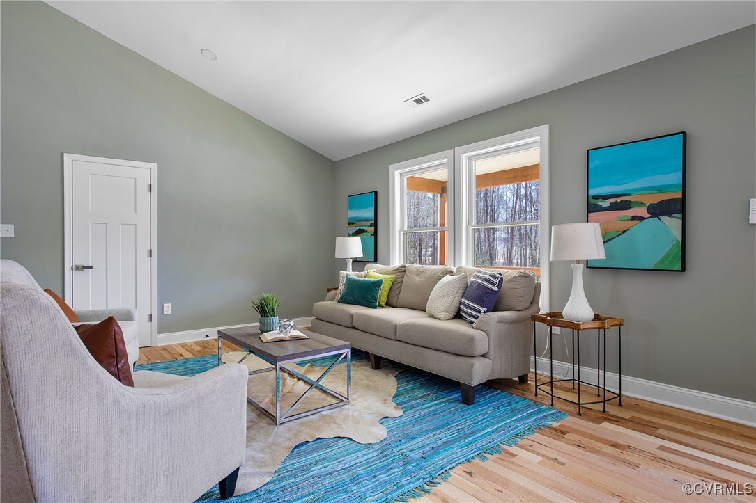 8001 Courthouse Road Providence Forge, VA 23140 - Photo 7 of 28 a living room with furniture and a window