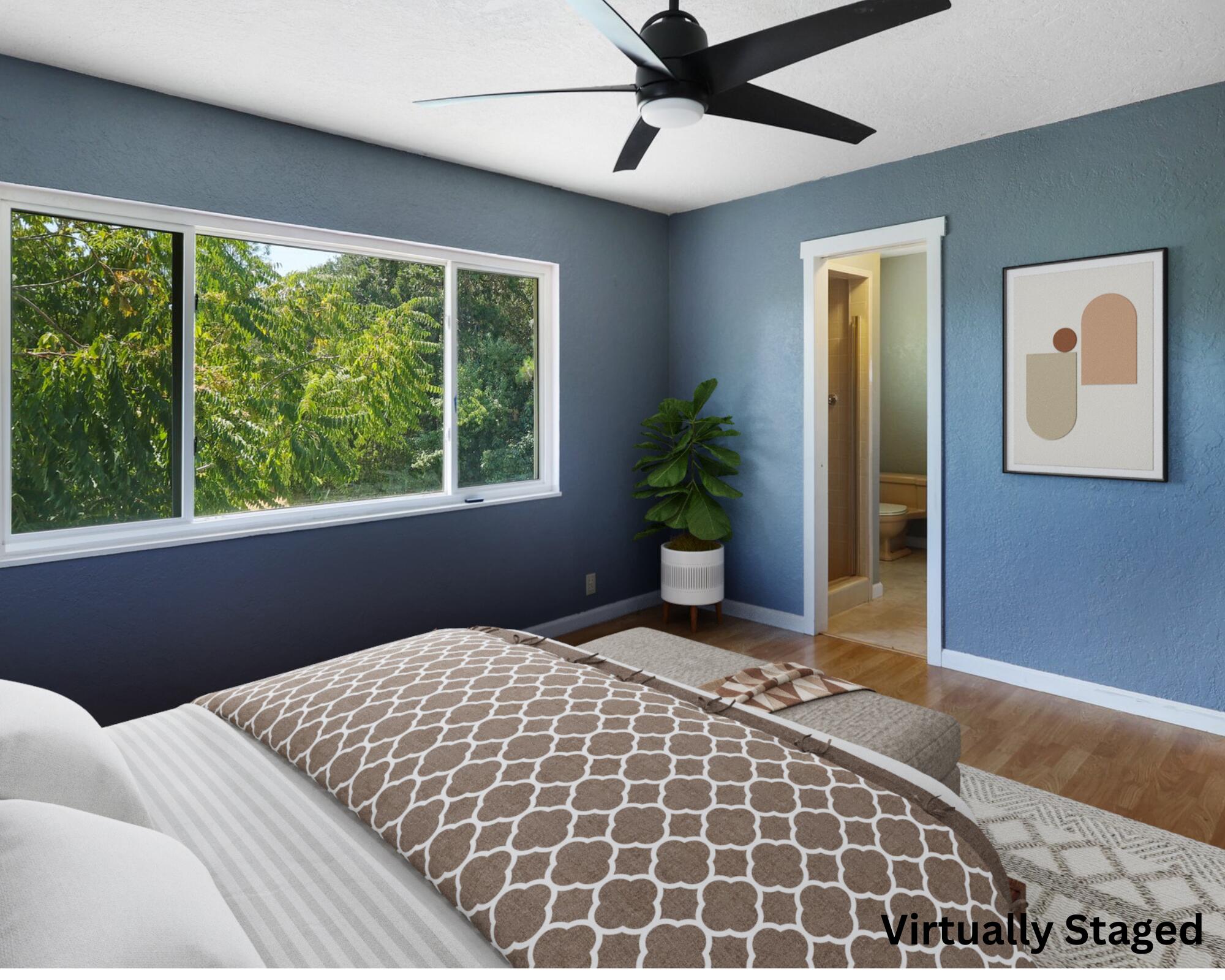 665 Overhill Drive Redding, CA 96001 - Photo 13 of 35 a bedroom with a bed and a window