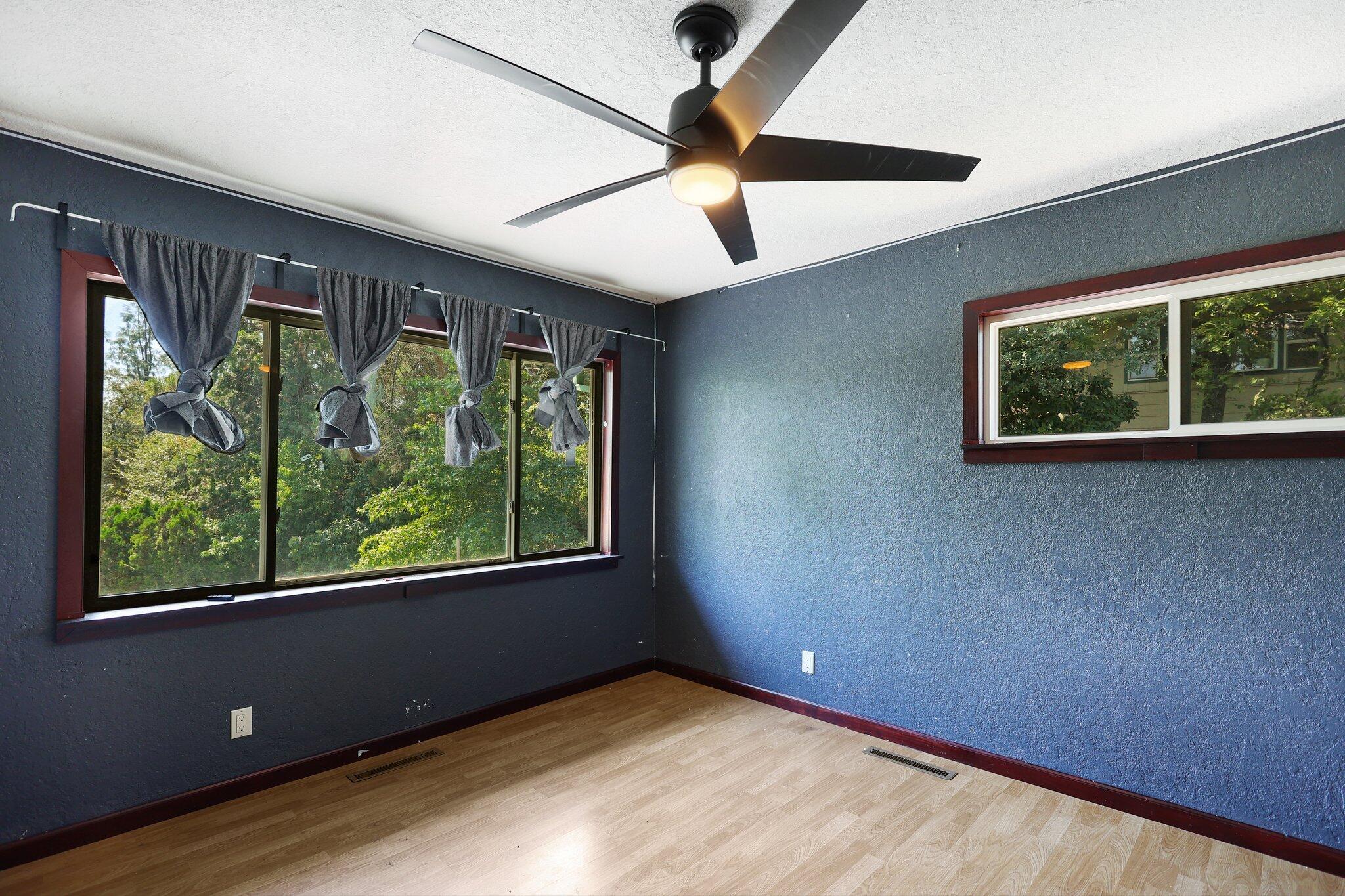 665 Overhill Drive Redding, CA 96001 - Photo 21 of 35 an empty room with large windows