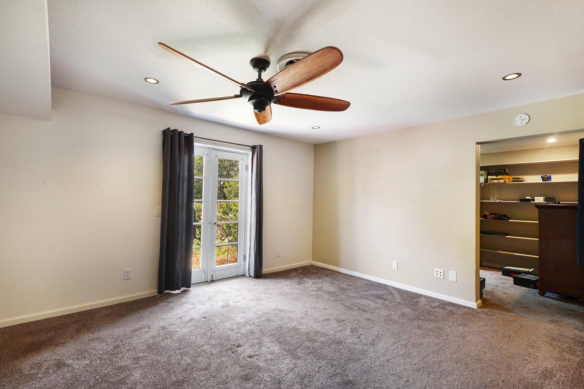 665 Overhill Drive Redding, CA 96001 - Photo 27 of 35 a view of an empty room with a window