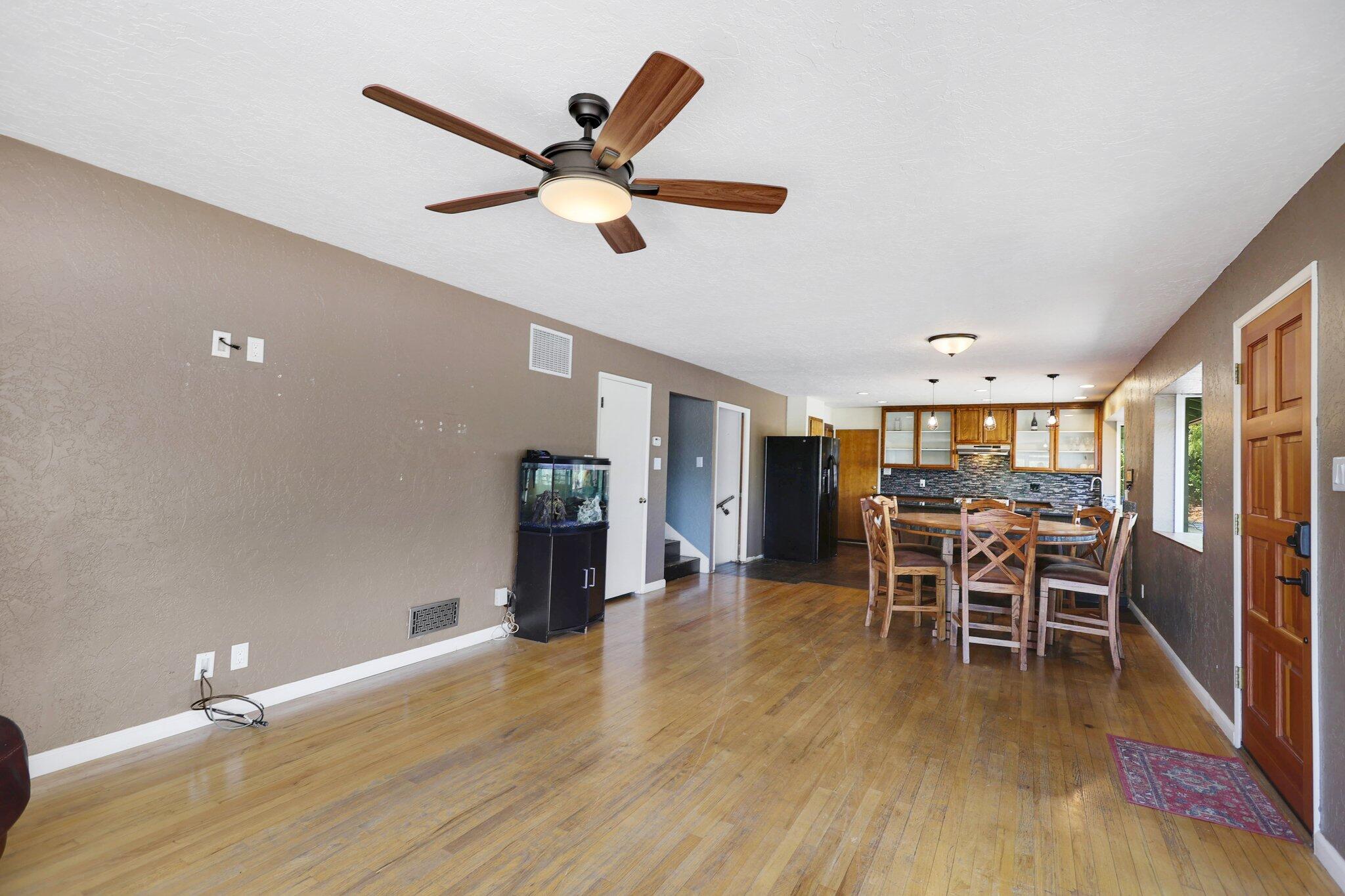 665 Overhill Drive Redding, CA 96001 - Photo 8 of 35 a dining room with furniture and wooden floor