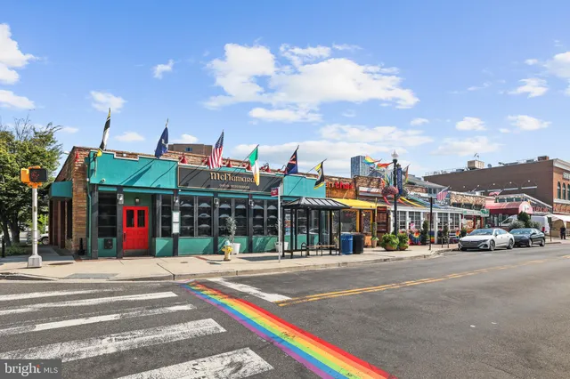 a view of a food mall next to a road