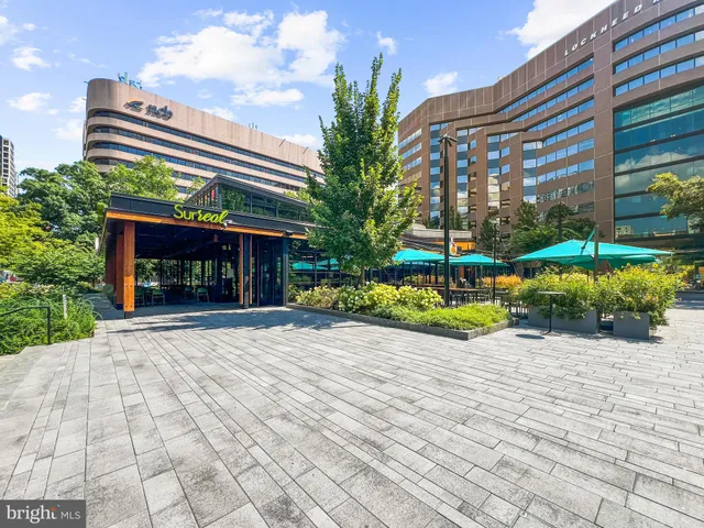 a view of a building with a yard