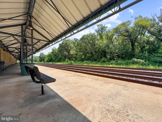 a view of a building with sitting area
