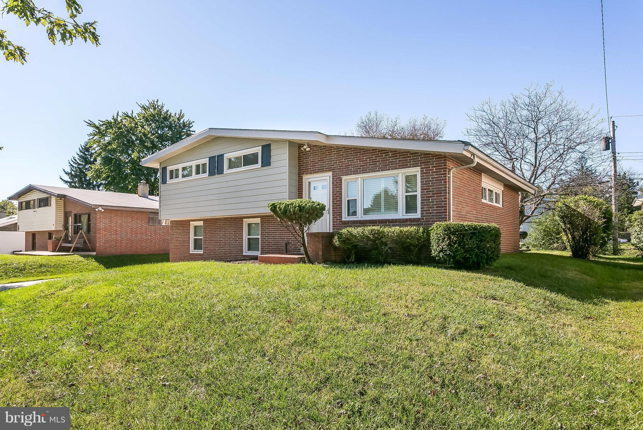 7313 Campfield Road Baltimore, MD 21208 - Photo 1 of 19 a house view with a garden space