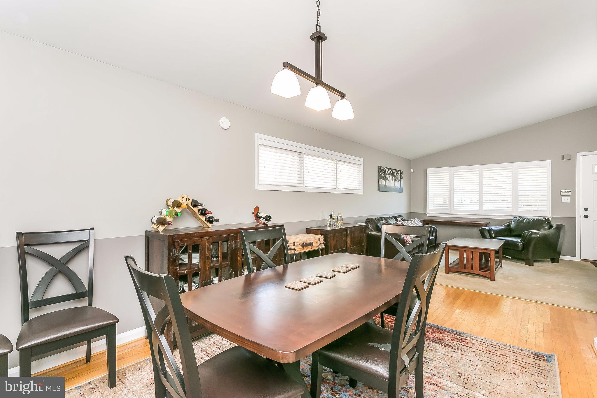 7313 Campfield Road Baltimore, MD 21208 - Photo 5 of 19 a view of a dining room with furniture and window