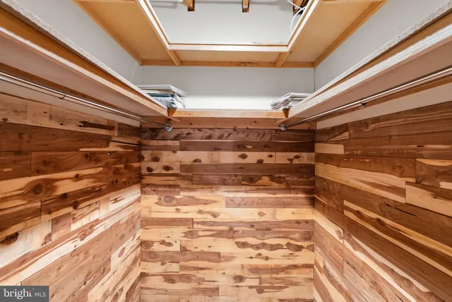 a bathroom with a sink a mirror and a shower curtain