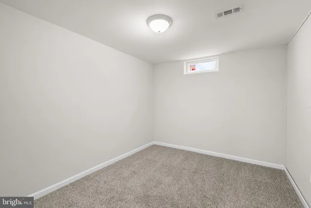 a kitchen with stainless steel appliances granite countertop sink stove and refrigerator