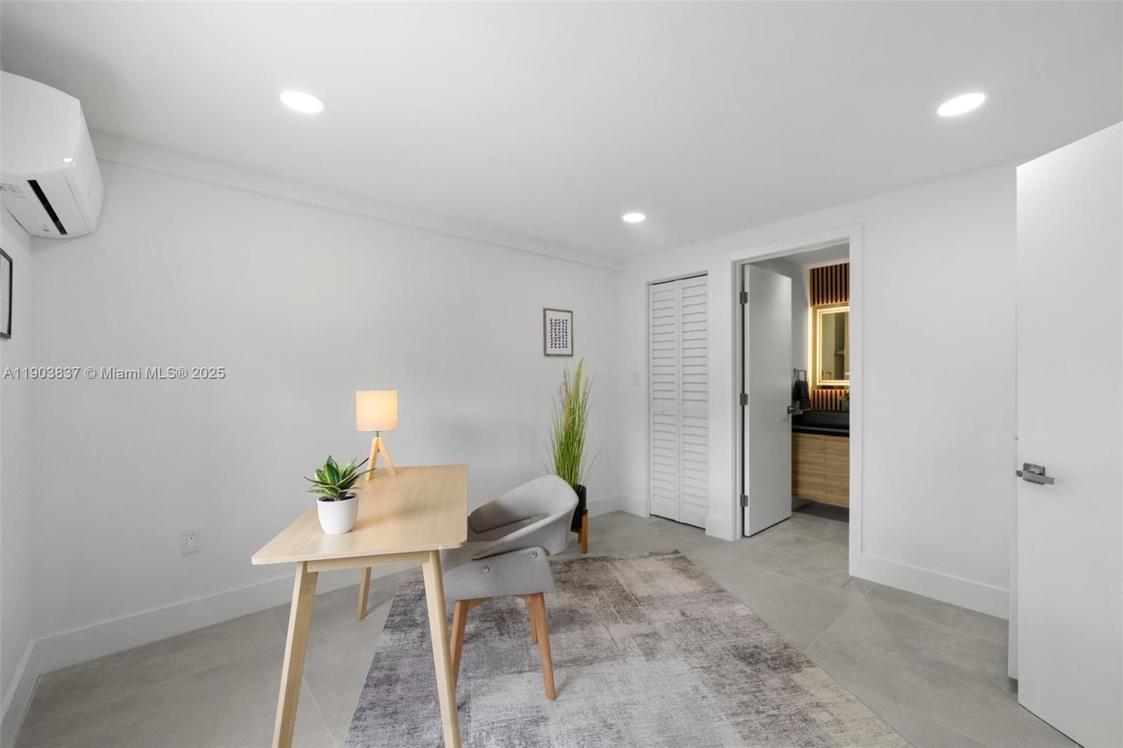 4301 Northwest 4th Street, Unit B Miami, FL 33126 - Photo 14 of 46 a living room with furniture and wooden floor