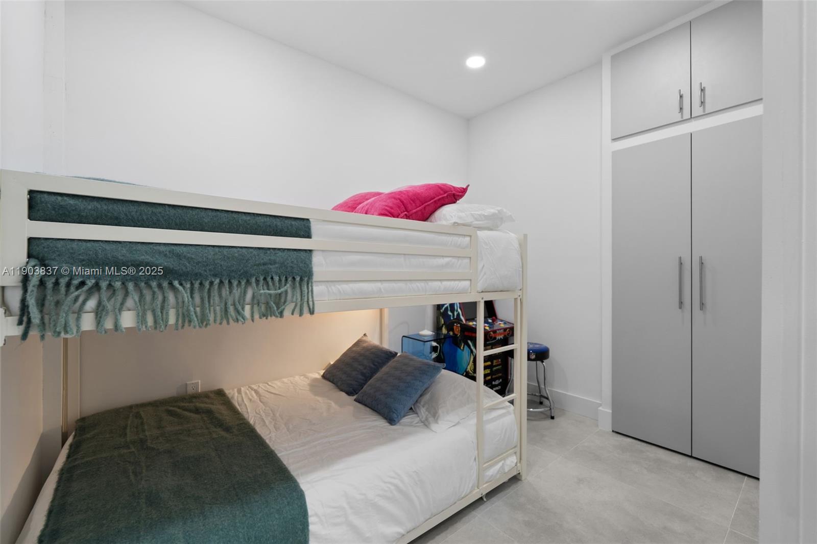 4301 Northwest 4th Street, Unit B Miami, FL 33126 - Photo 30 of 46 a bedroom with a bed and a closet