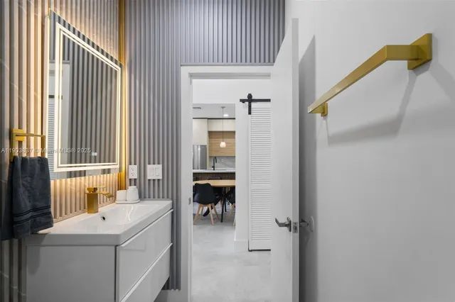 a view of living room and utility room