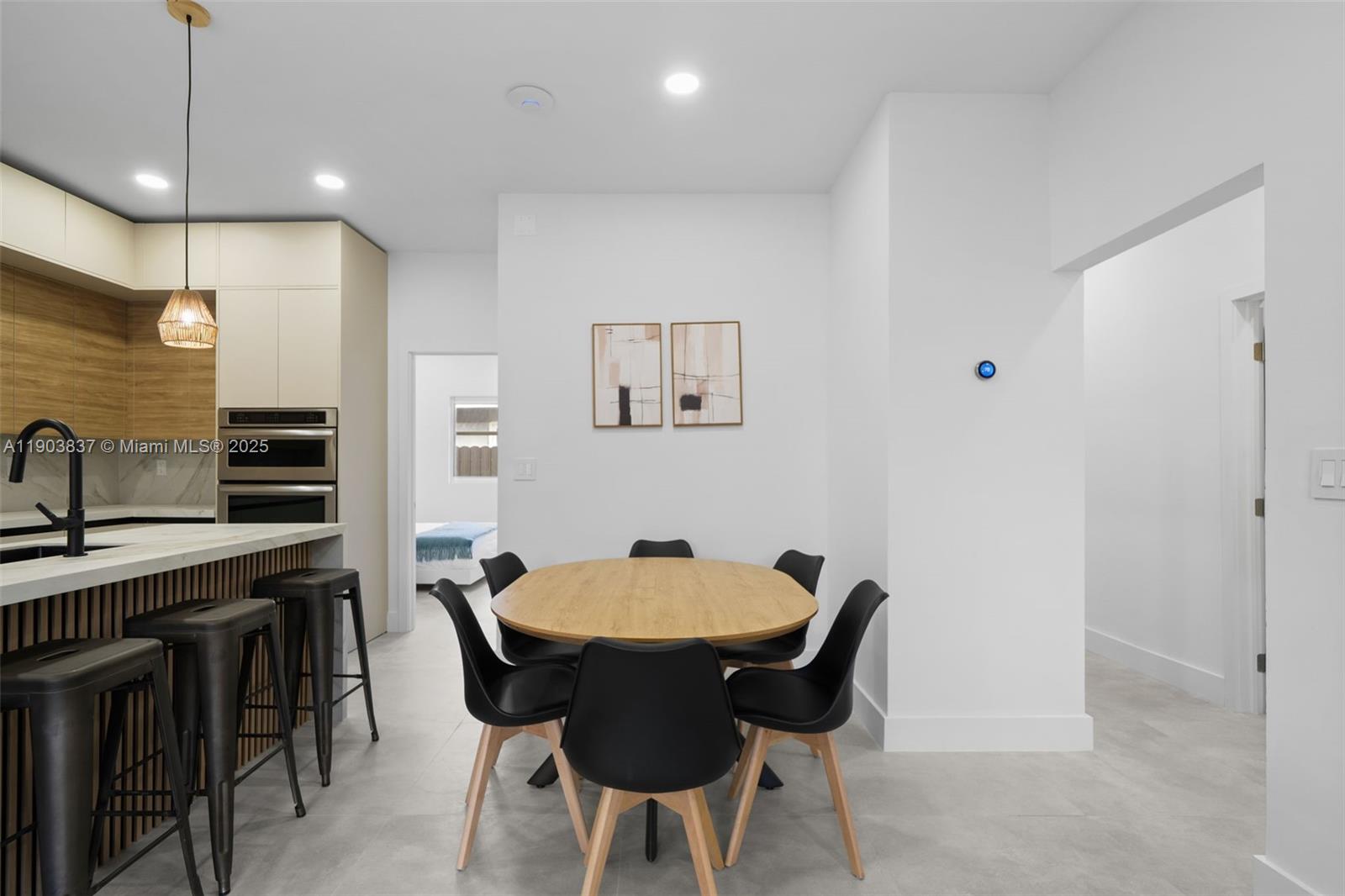 4301 Northwest 4th Street, Unit B Miami, FL 33126 - Photo 41 of 46 a view of a dining room with furniture