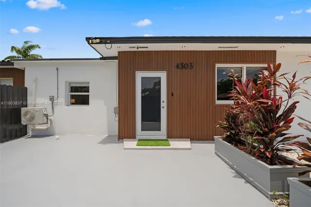 a view of a house with a garage