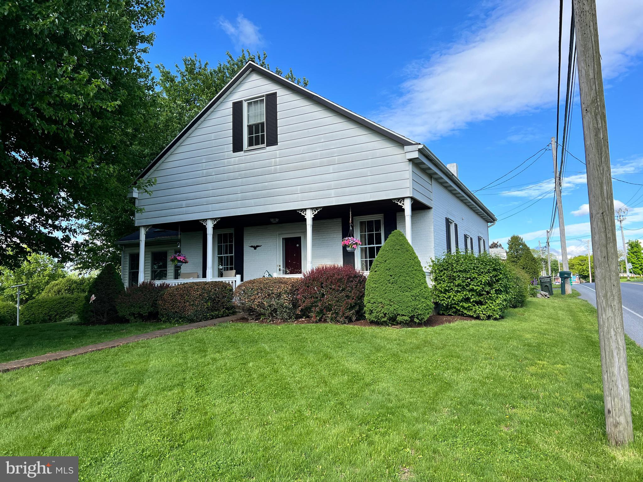 252 Doe Run Road Manheim, PA 17545 - Photo 2 of 32 a view of a house with backyard and garden