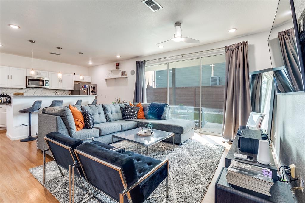 3121 Rutz Street Dallas, TX 75212 - Photo 5 of 24 a living room with furniture and a table