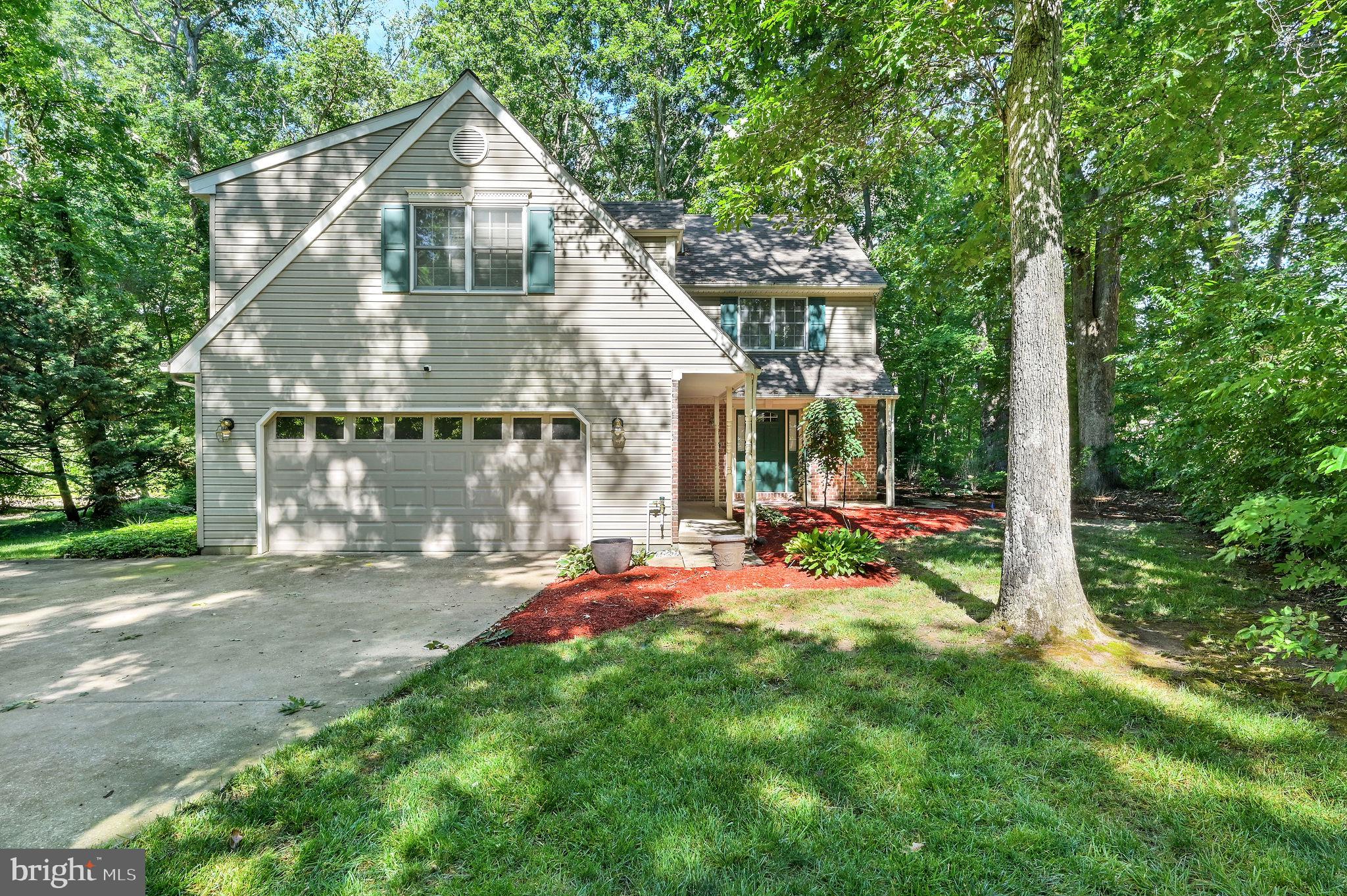 Charming home nestled in lush greenery.