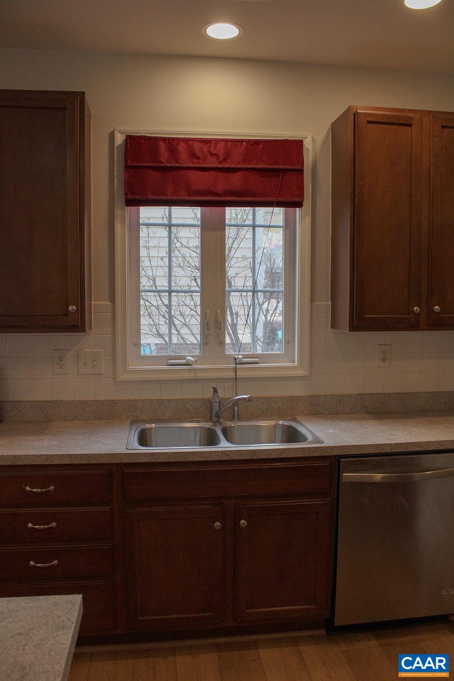 5335 Brookwood Road Crozet, VA 22932 - Photo 16 of 29 a kitchen with a sink and a window