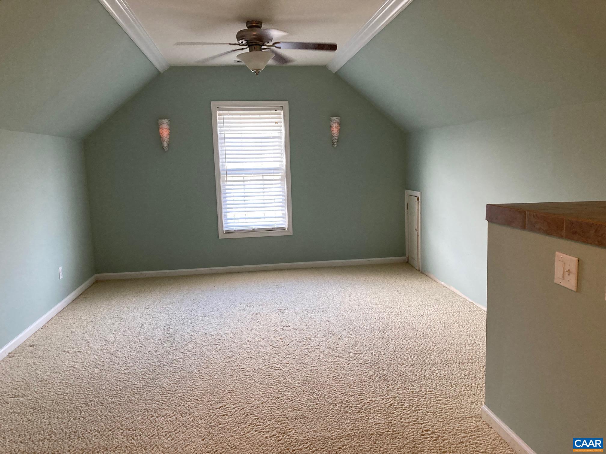 5335 Brookwood Road Crozet, VA 22932 - Photo 25 of 29 an empty room with a window and a ceiling fan