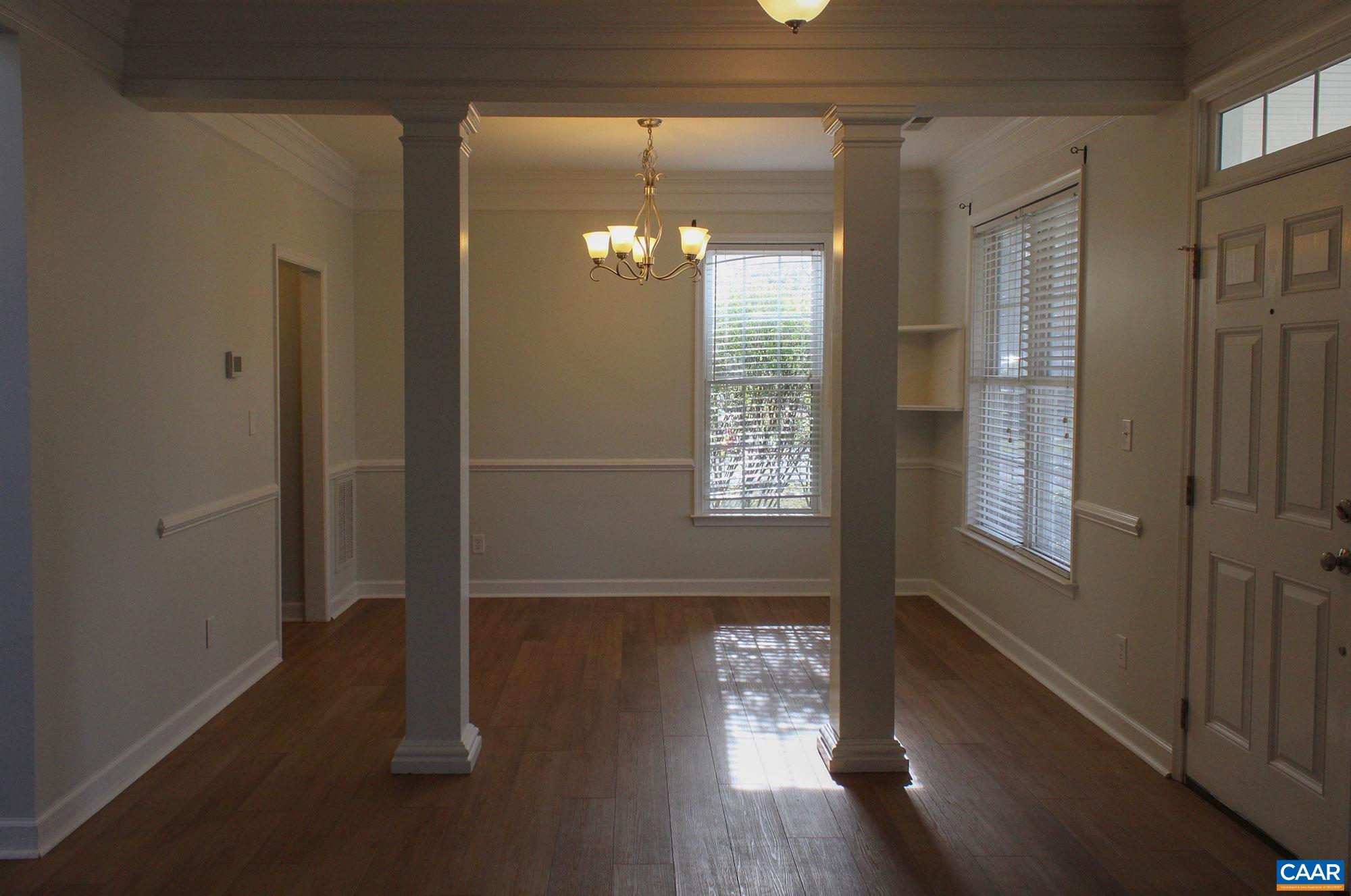 5335 Brookwood Road Crozet, VA 22932 - Photo 7 of 29 a view of empty room with windows and wooden floor