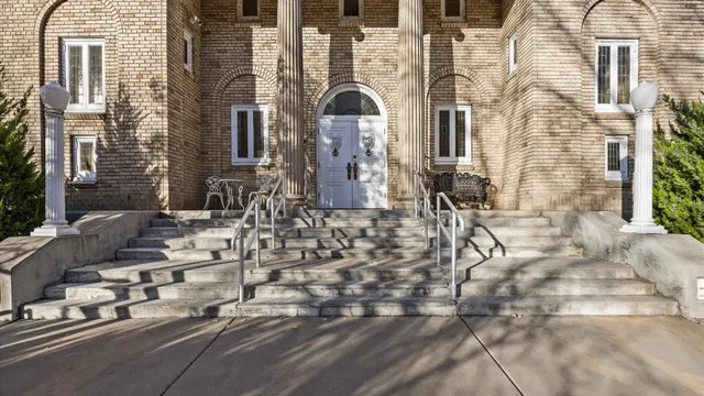 a front view of a house with a outdoor space