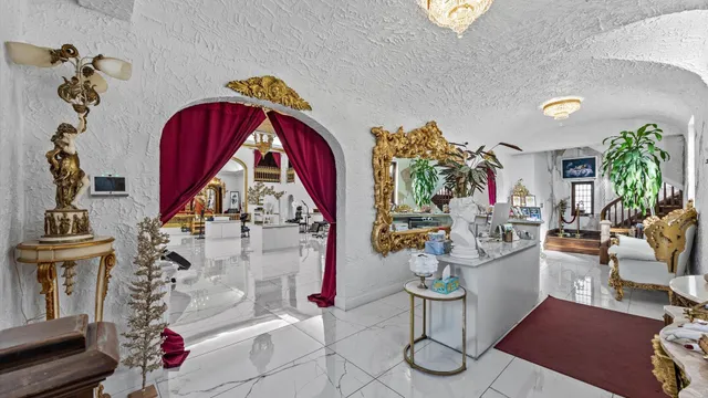 a picture of living room with furniture and wooden floor