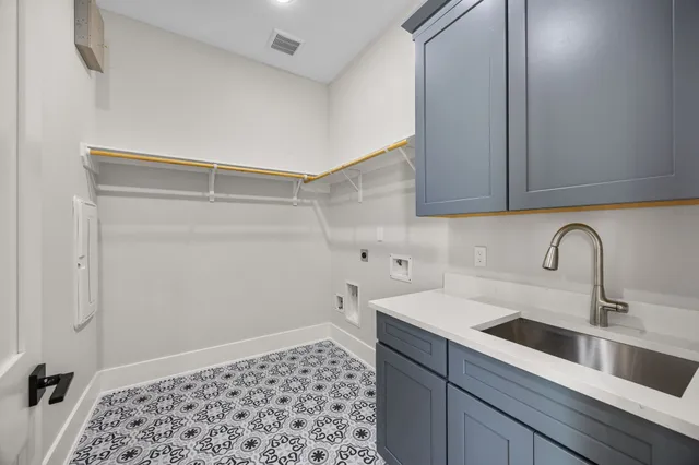 a view of a hallway with wooden floor and closet