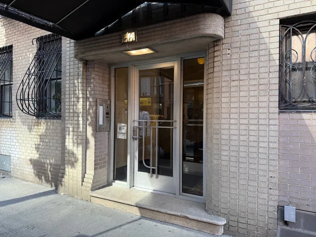 a view of entryway with a front door
