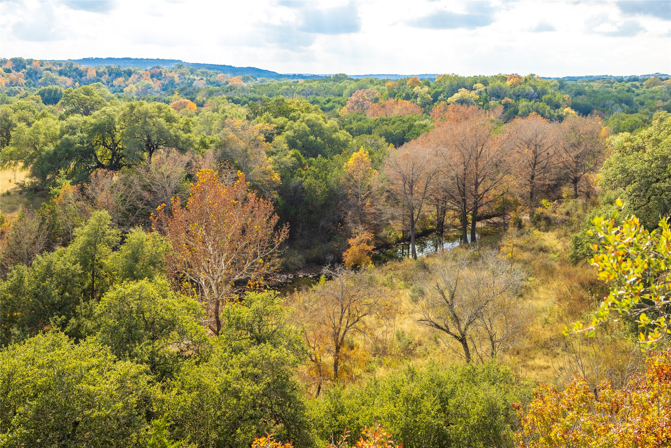 7301 Creek Road Dripping Springs, TX 78620 - Photo 9 of 22 a view of lake with mountain