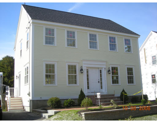 42 South Hampton Road Amesbury, MA 01913 - Photo 1 of 14 a front view of a house with a yard